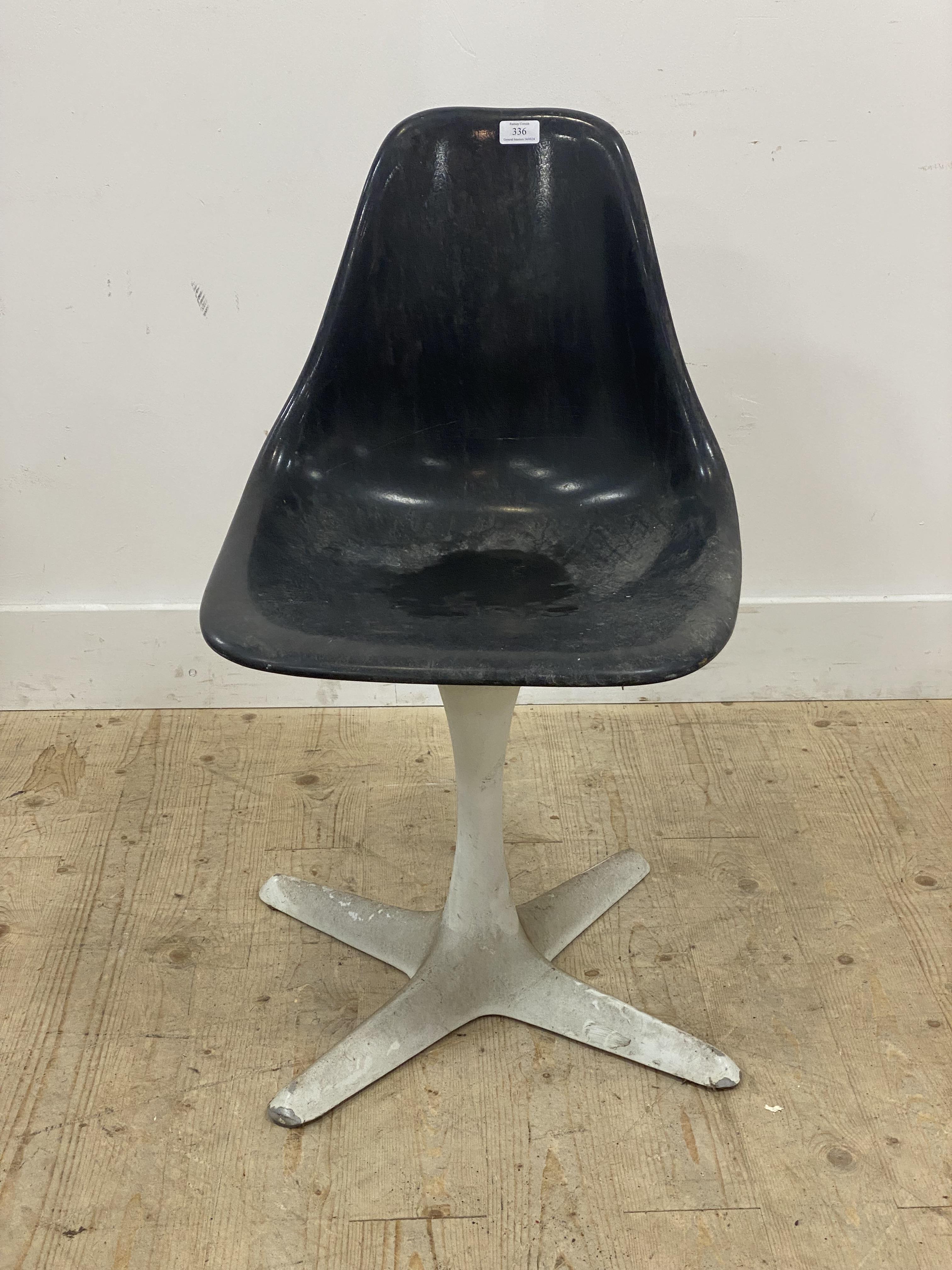 Arkana, a mid century 'Tulip' chair, moulded seat raised on a cast aluminium four point swivel base.