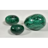 Three malachite decorative eggs (largest l-8cm smallest l-4cm) (3)
