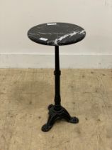 A cast iron and marble wine table. H60cm, D30cm.