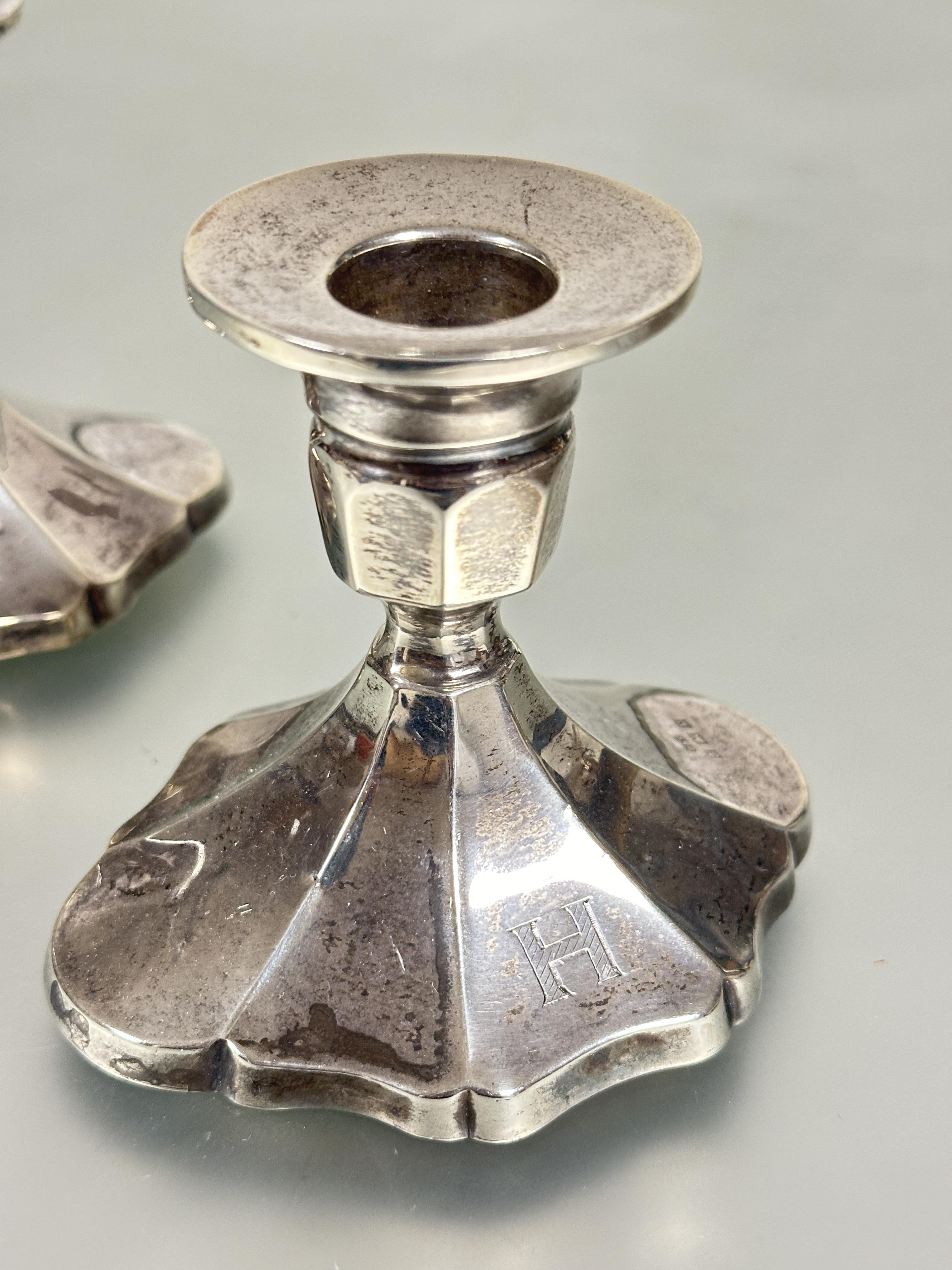 A pair of Birmingham silver short table candle sticks with octagonal tops raised on quatrefoil style - Image 2 of 4