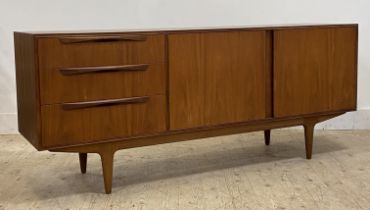 McIntosh, a mid century teak sideboard, fitted with three drawers and two cupboards, raised on