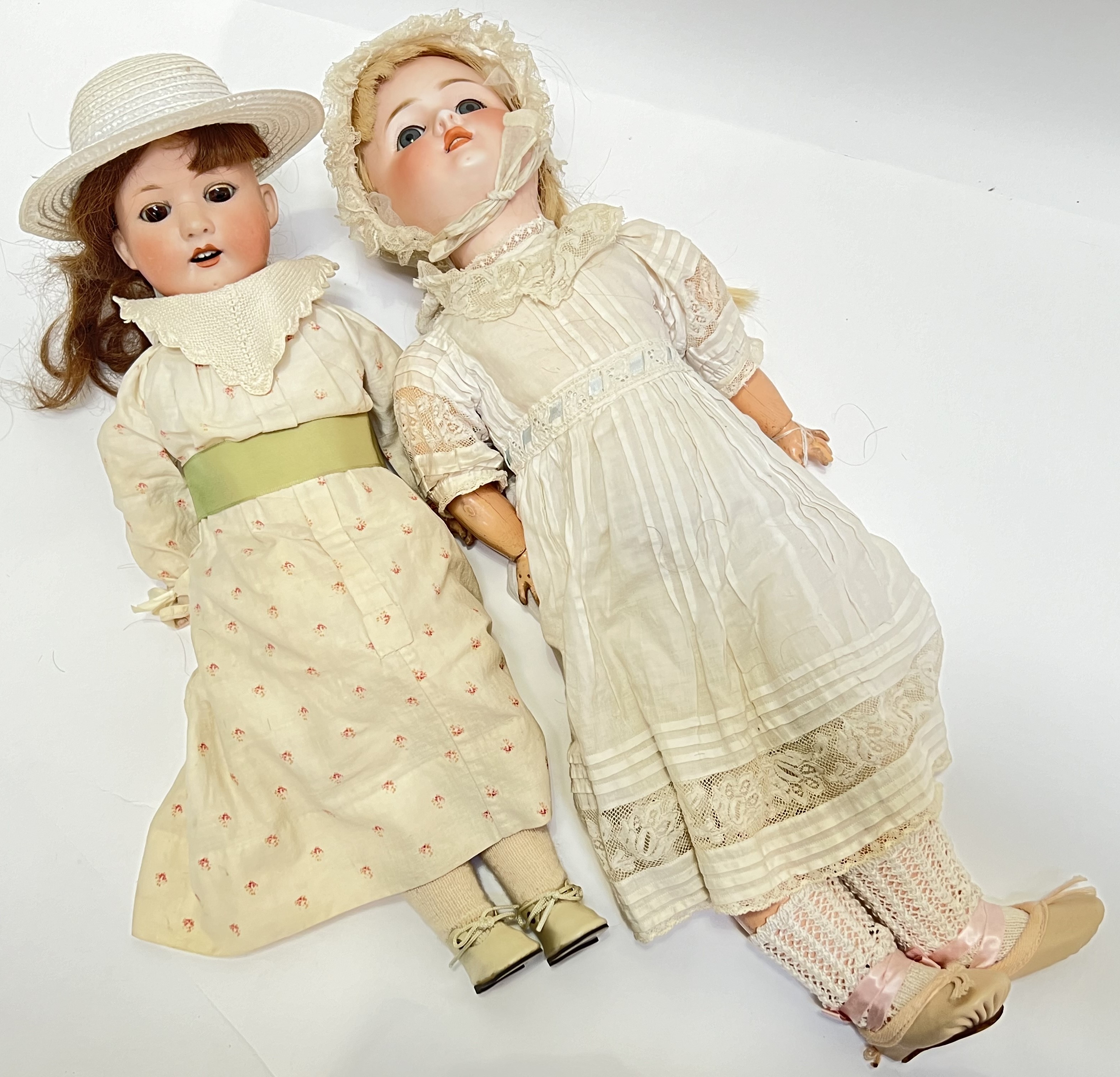 A Simon and Halbig (l- 59cm) bisque head doll together with a Heubach Koppelsdorf German bisque head