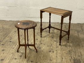 An early 20th century rosewood occasional table, the circular top inlaid in ebony with elephant,