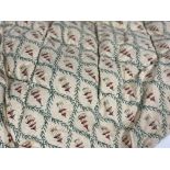 A Vintage Eiderdown or comfy quilt, the fabric with repeating pagoda and running leaf design, (