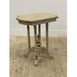 An early 20th century painted hardwood end table, the shaped top on cluster columns and four