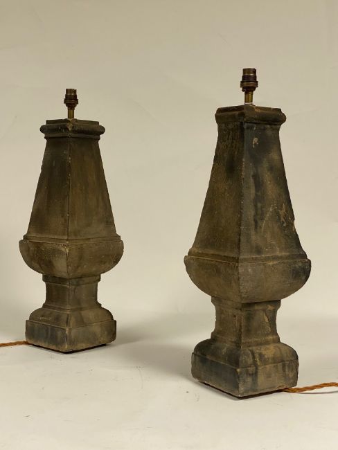 A pair of 19th century carved stone balustrades, of faceted baluster form, converted to table lamps.