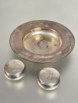A modern silver dish with sunk center and engraved inscription 1890 Rothmans 1999 D x 13cm and a