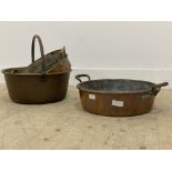 A set of three brass and copper preserve pans, 19th century. largest W43cm. .