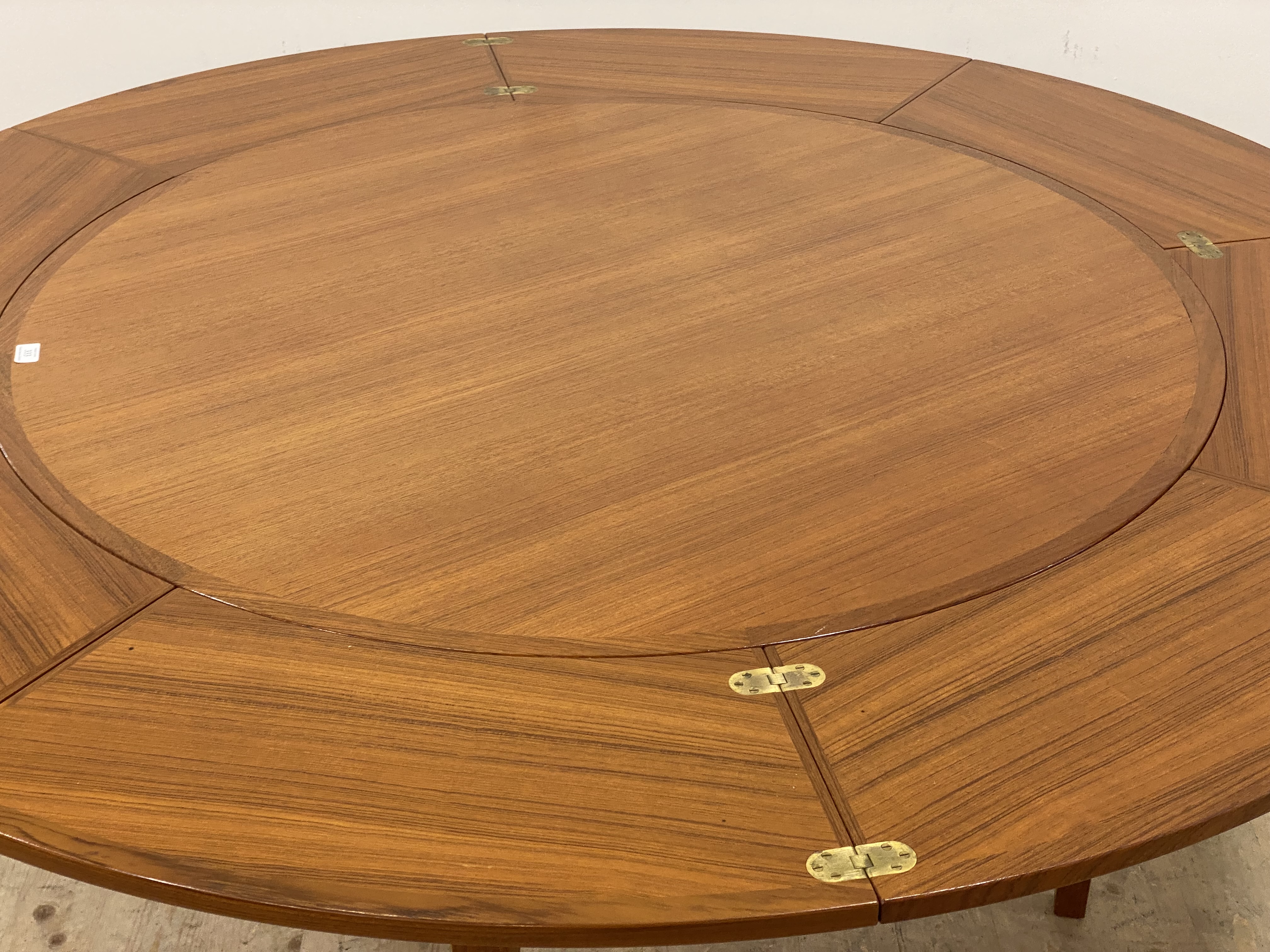 Dyrlund, a Danish teak mid century extending dining table, the top with four segmented and fold over - Image 2 of 4