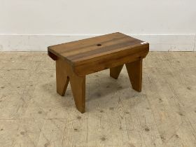 A vintage waxed pine creepie type stool, with pierced top and shaped panel end supports. H30cm,
