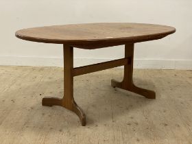 G-plan, a mid century teak extending dining table, the oval top opening for a fold out leaf,