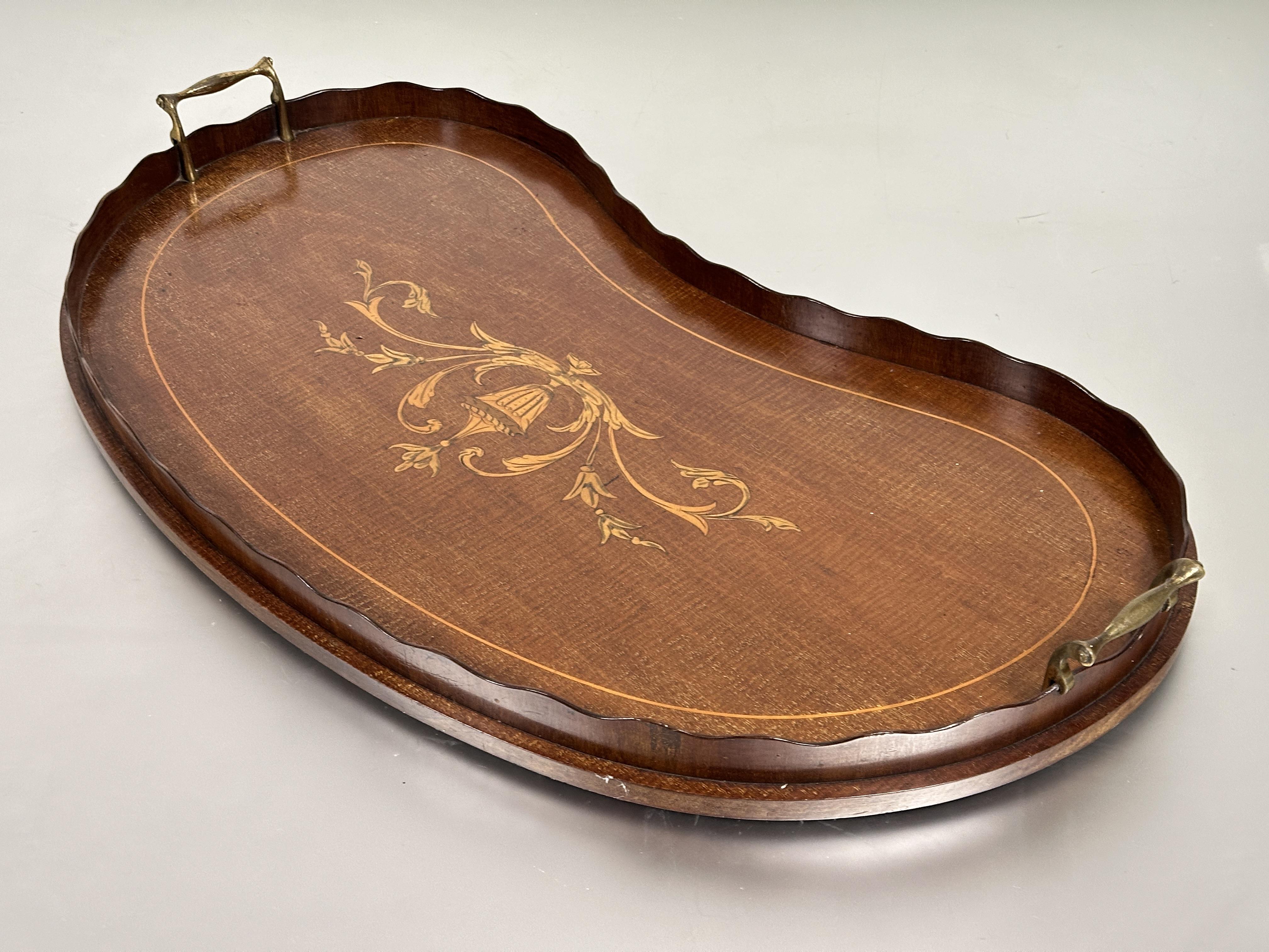 An Edwardian mahogany kidney shaped two handled tea tray with scalloped gallery and inlaid - Image 3 of 3