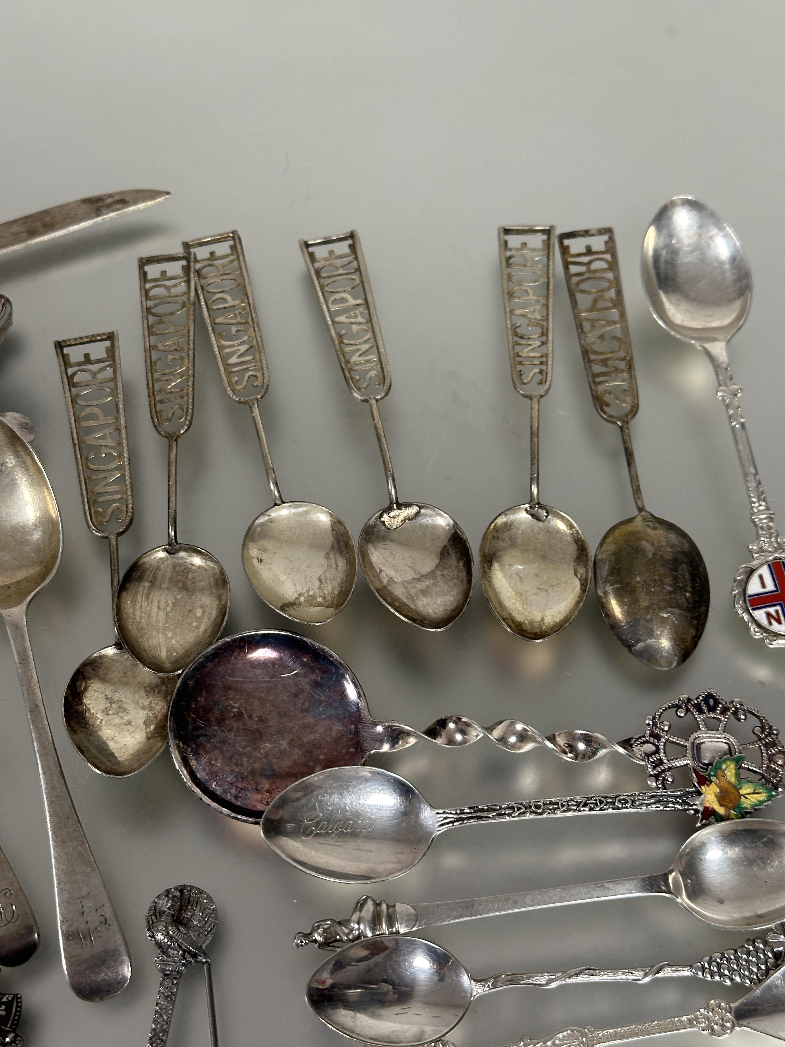 A collection of silver and white metal spoons to include a set of six Singapore handled tea spoons L - Image 2 of 4
