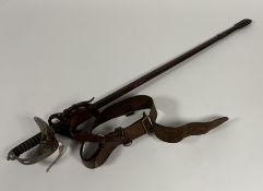 1897 Officer's pattern sword in leather scabbard with leather frog and Sam Brown belt