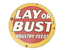 Original 'Lay or Bust Poultry Feeds' enamel sign, 28.5cm diameter