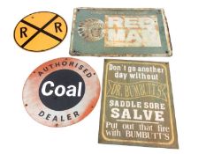 American 'Red Man' tobacco sign, an American road sign, a Coal dealer sign, and a reproduction Saddl