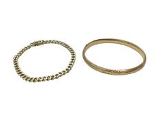 14ct gold curb link bracelet and a 14ct gold bangle (2)
