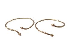Pair of Jamaican gold torque bangles, stamped 14k