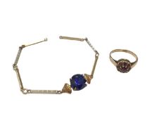 9ct gold garnet cluster ring and a yellow and white metal bar link chain set with a synthetic blue g