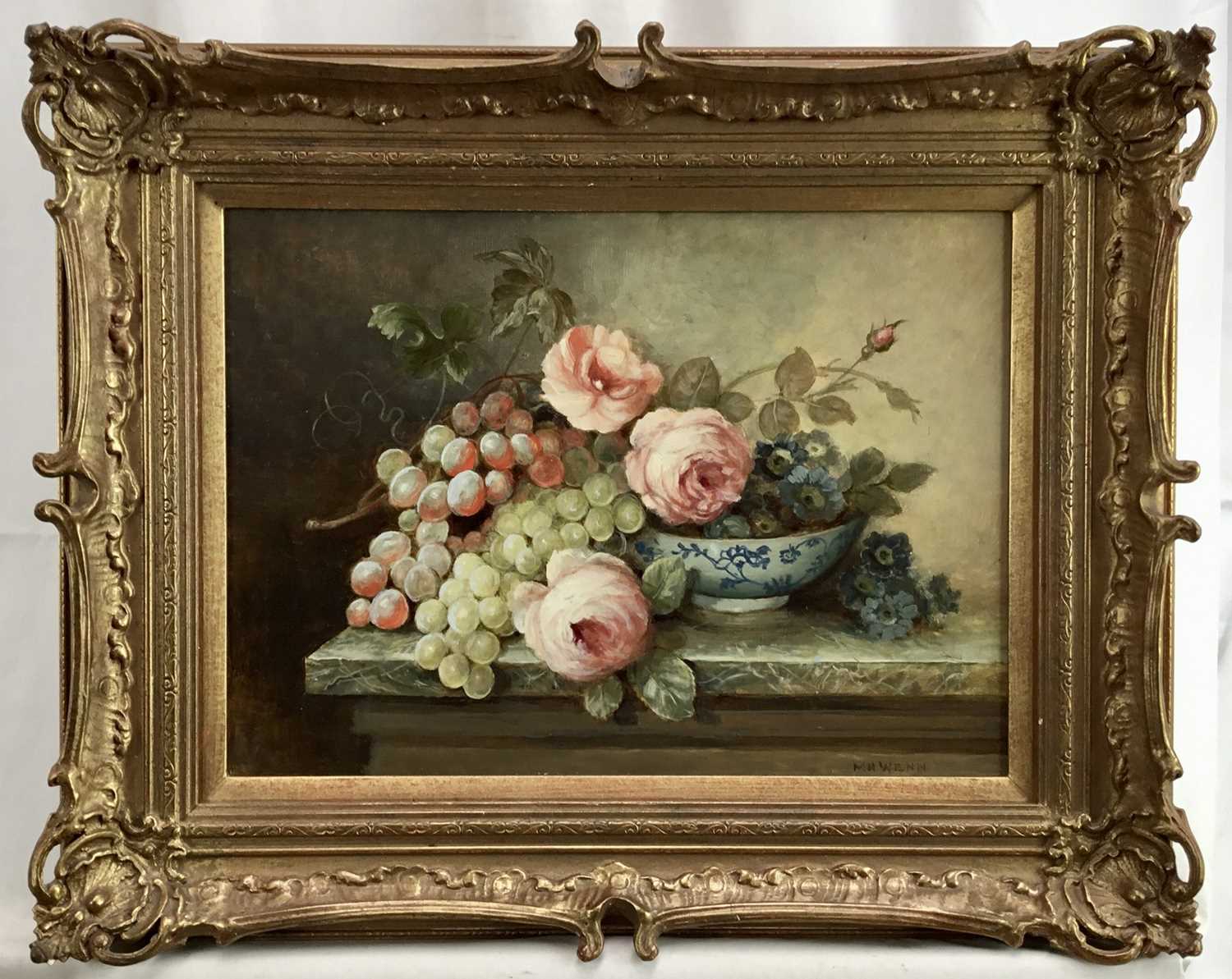 M.H. Wenn, oil on board, still life of grapes and flowers in a bowl on a marble table top, signed, i