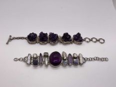 Two silver and amethyst bracelets, one with a large central cabochon amethyst, moonstones and freshw