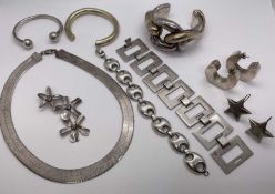 Group of silver jewellery to include a Mexican silver bracelet of modernist design, three silver tor
