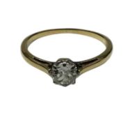 Ladies diamond solitaire ring, the cushion shaped diamond estimated to weigh approximately 0.25 cara