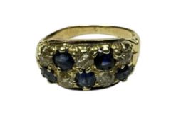 Late Victorian diamond and sapphire ring with a double row of old cut diamonds alternating with mixe