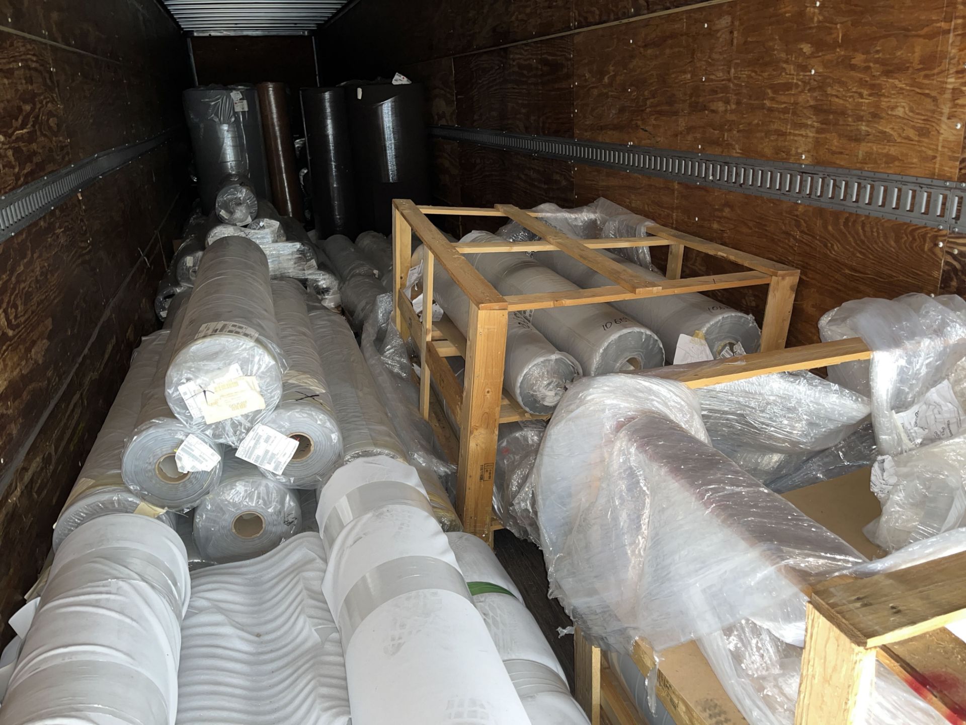 Trailer of Material including Rolls of Material