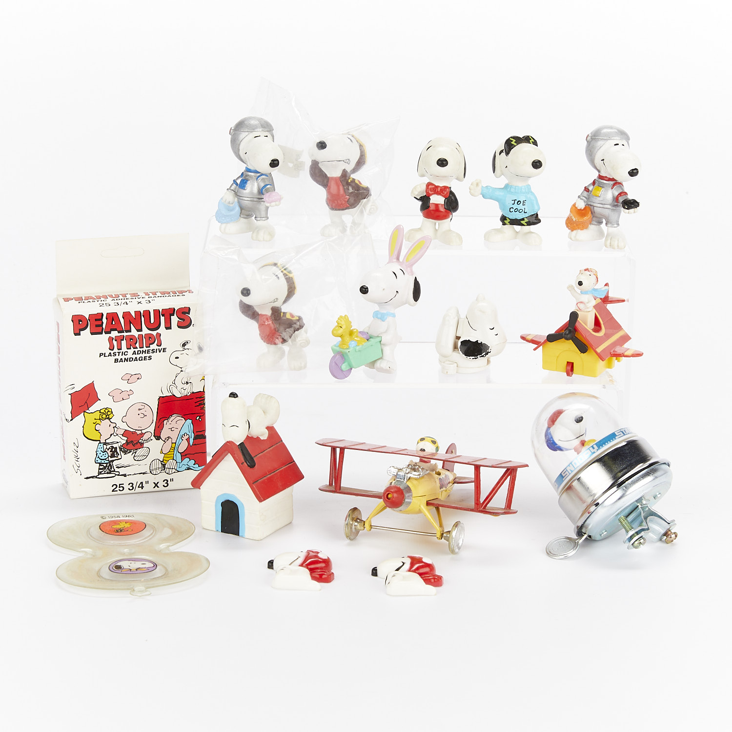 Group of 16 Snoopy Figurines and Bandages