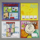 4 Peanuts Calendars 1999-2002
