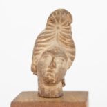 Small Etruscan Head with Wooden Stand