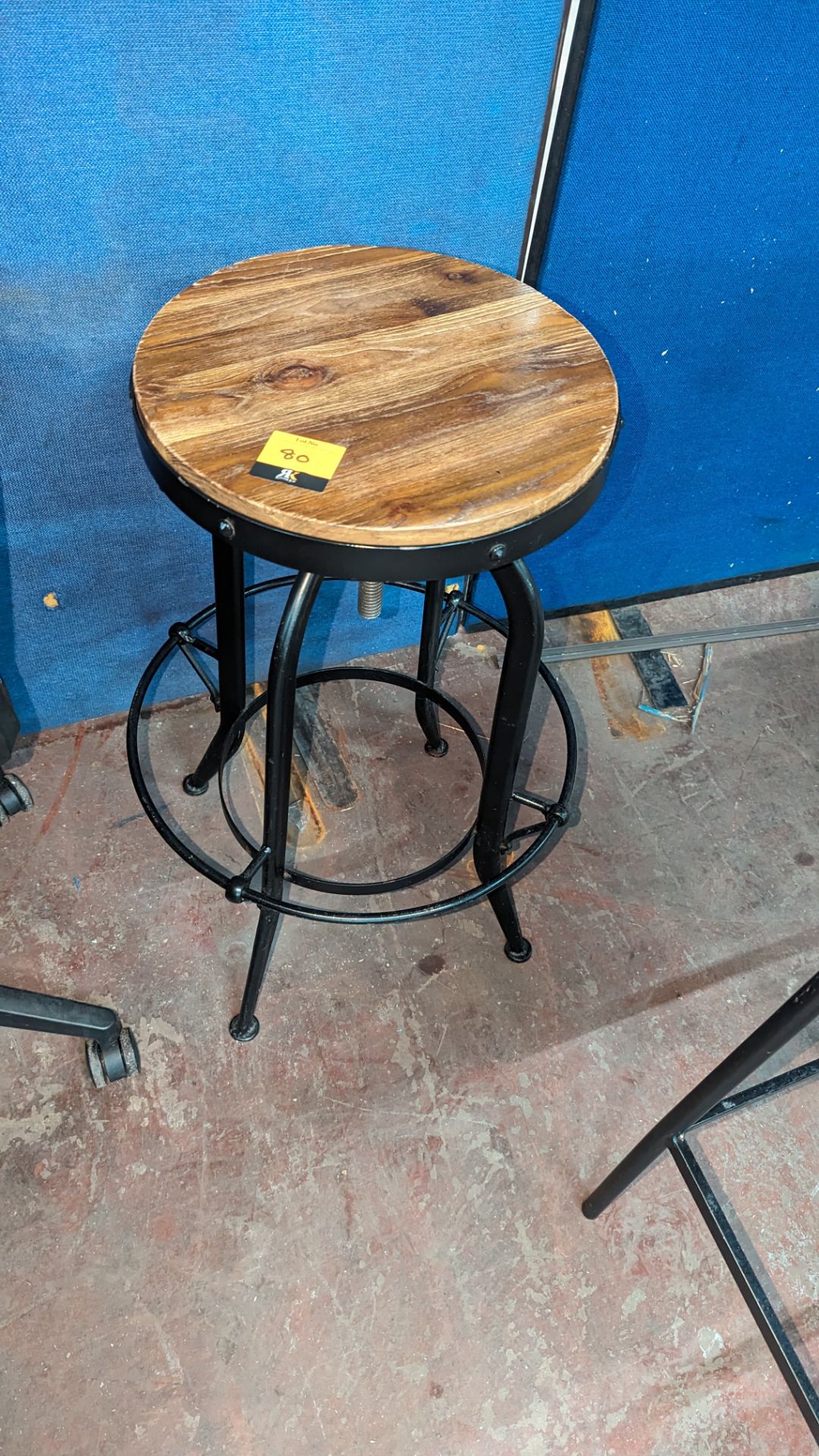 Unusual stool with black metal frame & wooden height adjustable seat