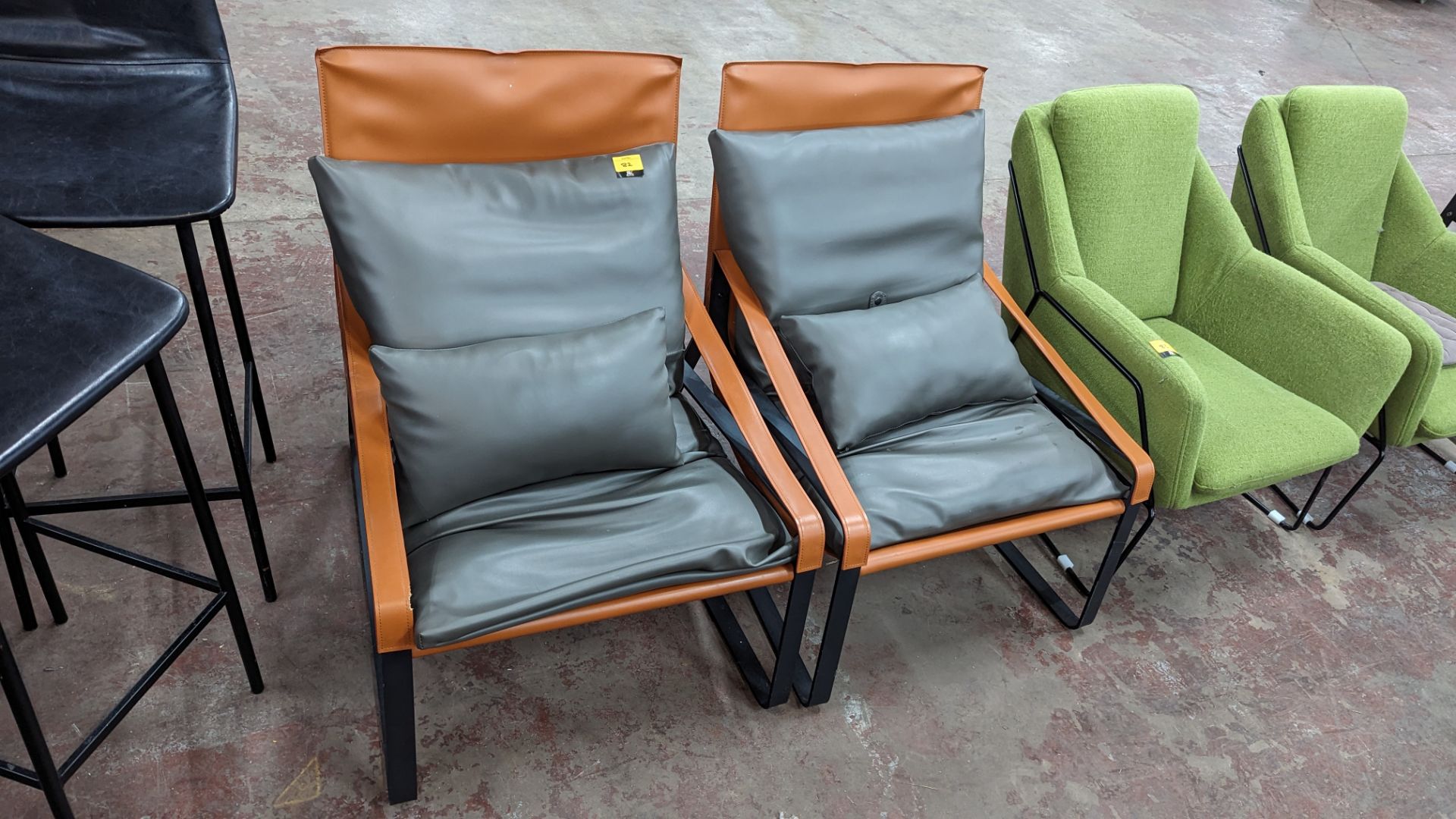 2 chairs on heavy duty black metal frames with tan colour pleather fabric and grey cushioning - Image 2 of 7