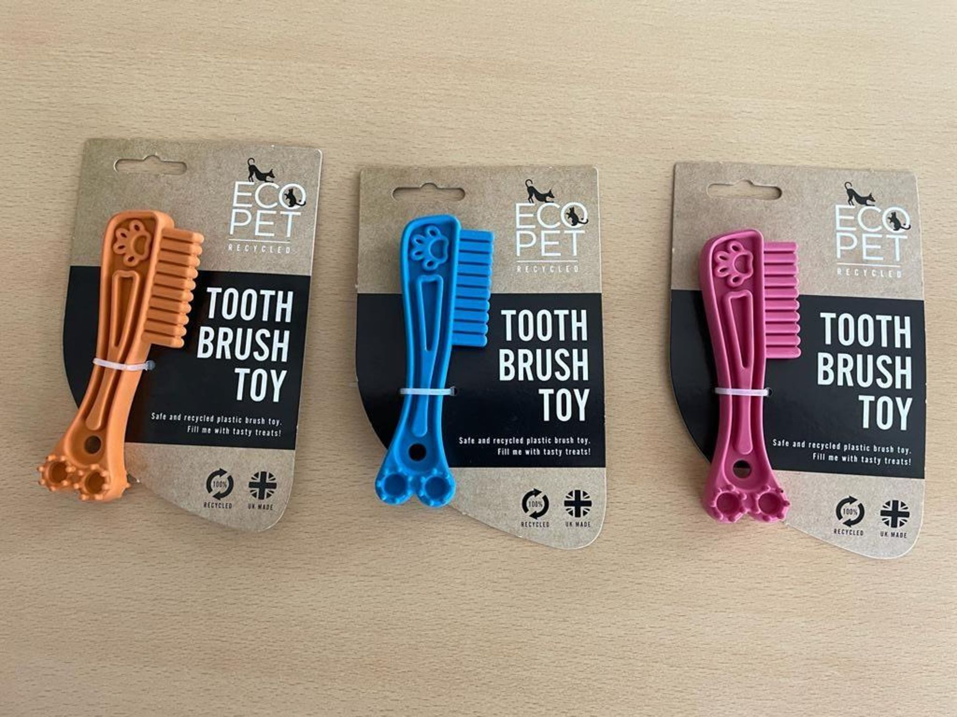 288 toothbrush shaped dog chew toys in assorted colours. Made in the UK from recycled polymer, bran