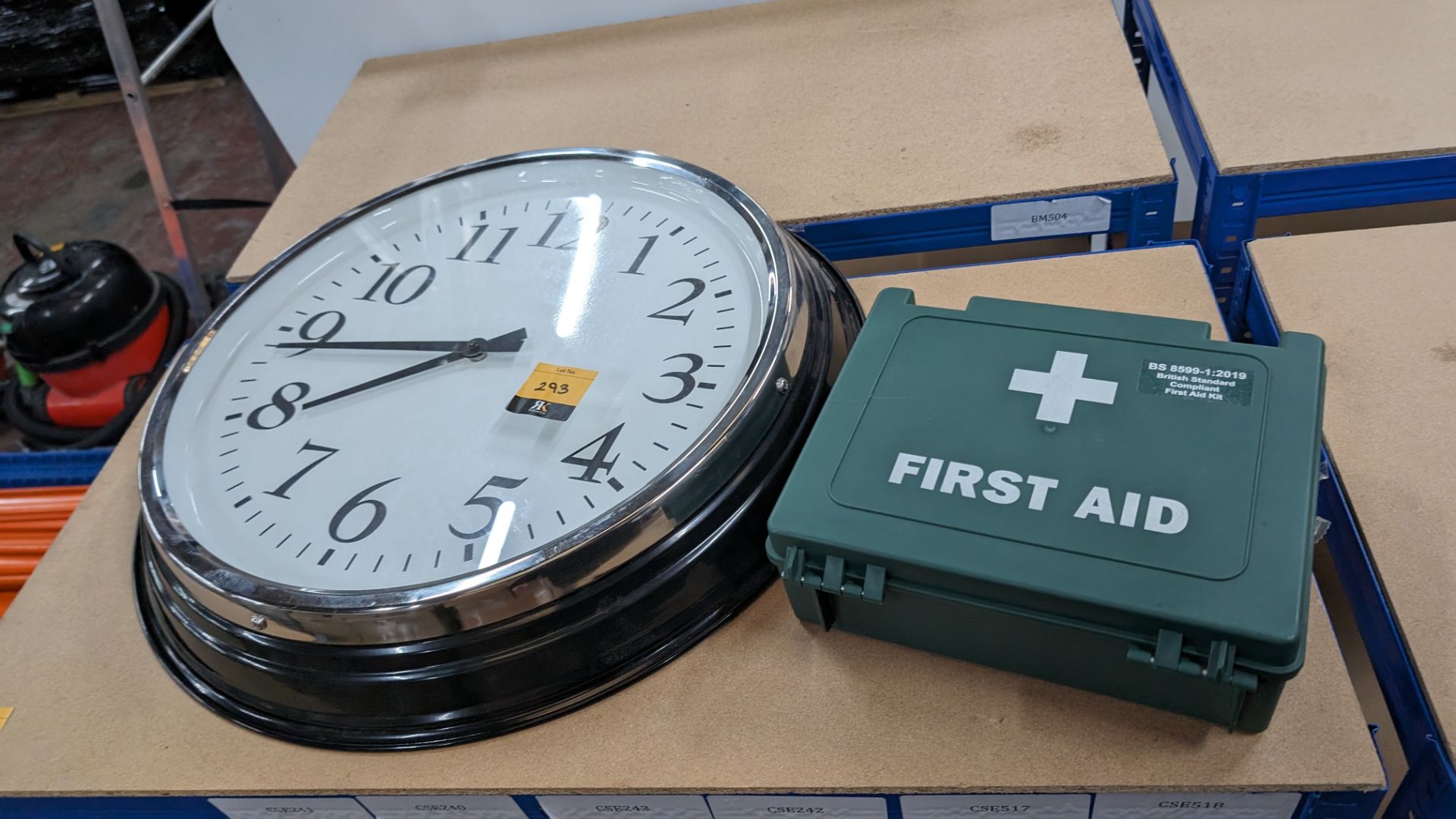 Mixed lot comprising large wall clock plus first aid kit & contents