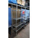 Stainless steel mobile shelving unit with a total of 4 shelves, max external dimensions approximatel