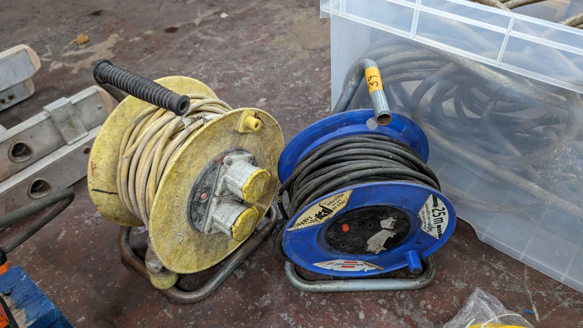 2 off multi-socket extension cables on dispensing reels, 1 being 110V & the other being 240V