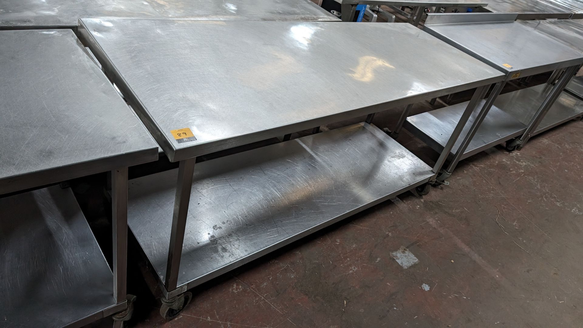 Stainless steel large mobile twin tier table, max dimensions 1800 x 640mm x 860mm