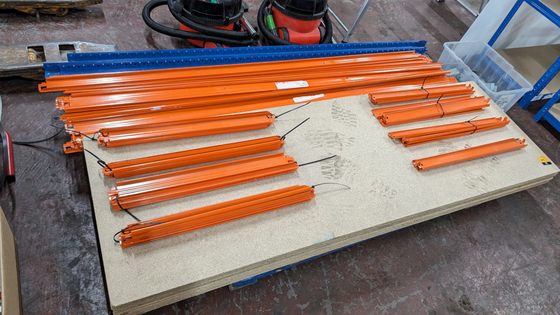 Quantity of orange & blue bolt-free racking comprising 8 uprights each 1,785mm tall, 16 beams each 1