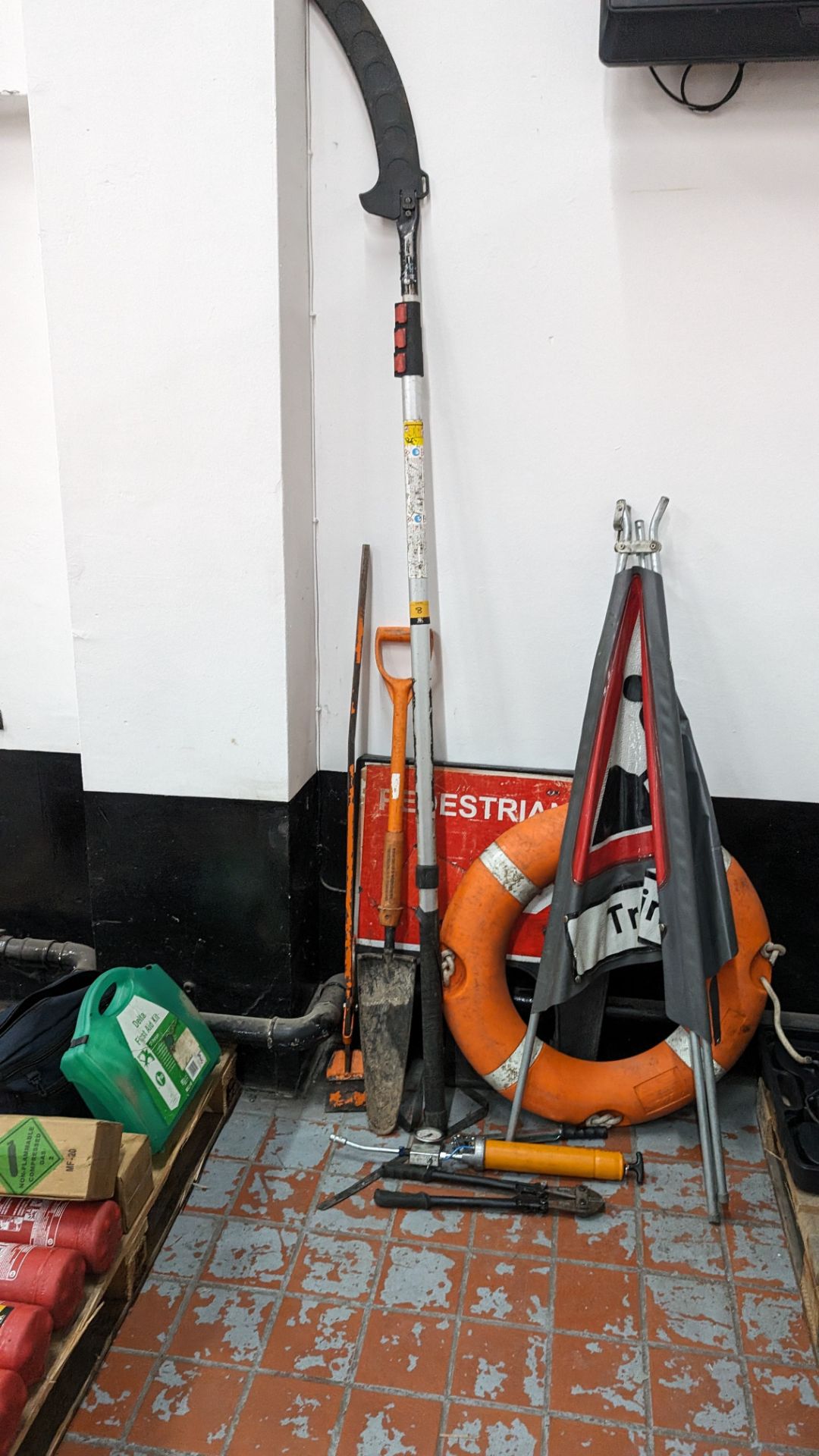 Quantity of signage, tools & more including very long handled pole saw