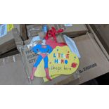 Box of Superman hanging door signs