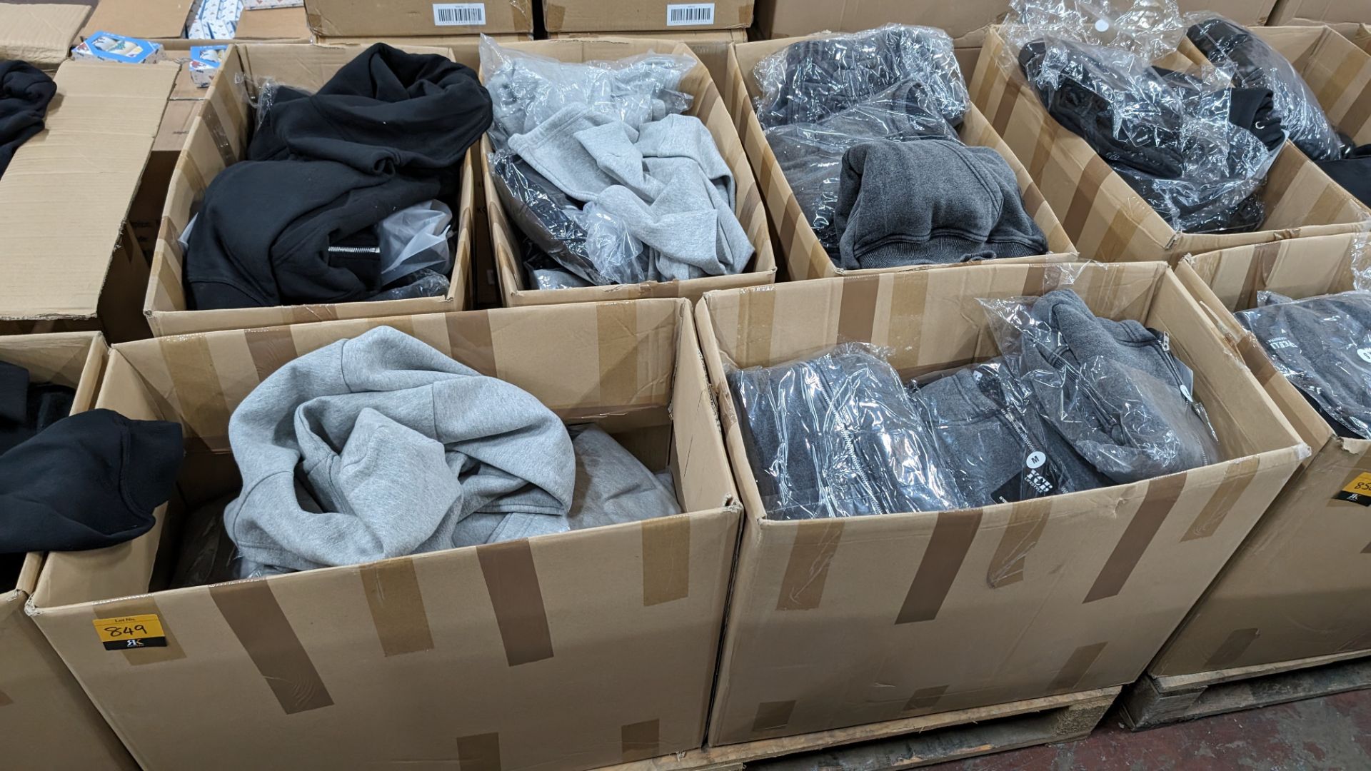5 boxes of YCB zip-up hoodies, crop tops & similar - the contents of a pallet