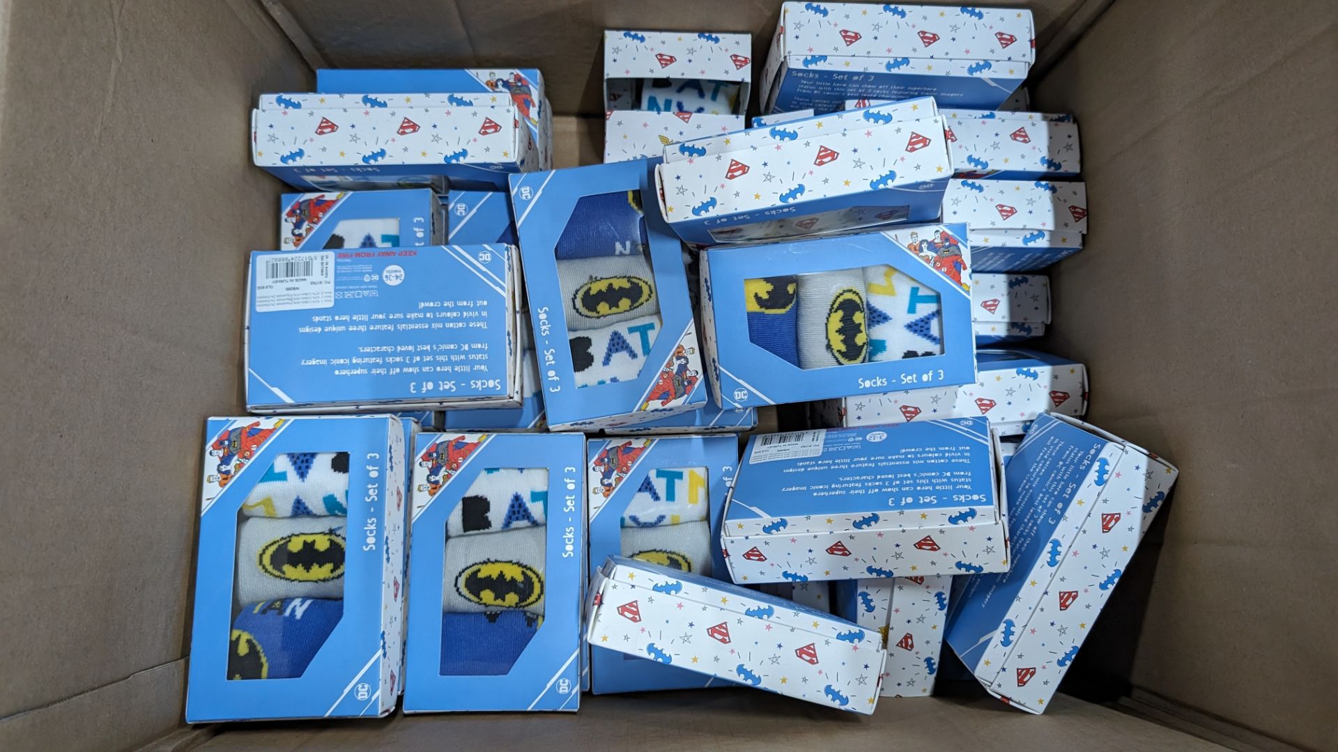 Box of DC Comic Super Hero branded socks in triple packs - Image 2 of 3