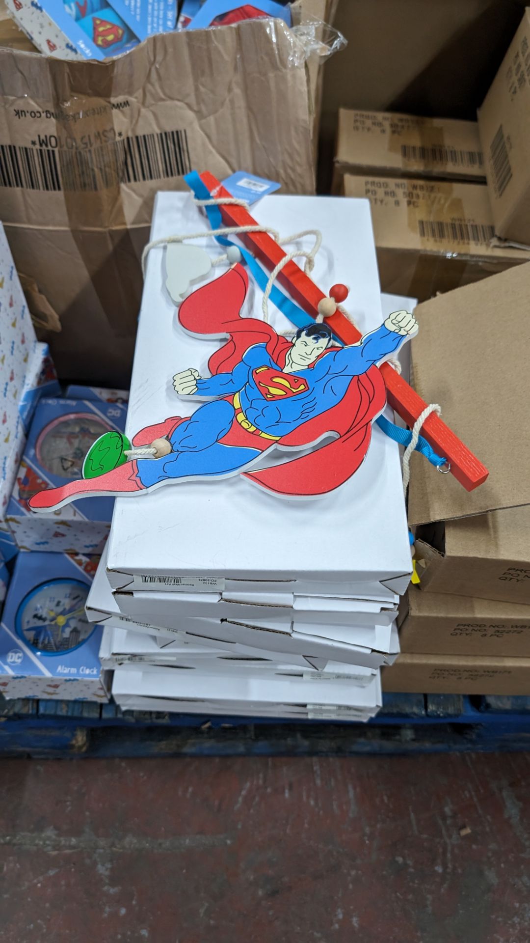 The contents of a pallet of Super Hero gifts including socks, hanging signs, alarm clocks, stacking - Image 4 of 11