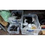 The contents of 3 crates of assorted camera enclosures and related items