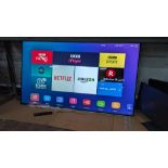 Hisense large flat panel TV with remote control - no bracket or stand