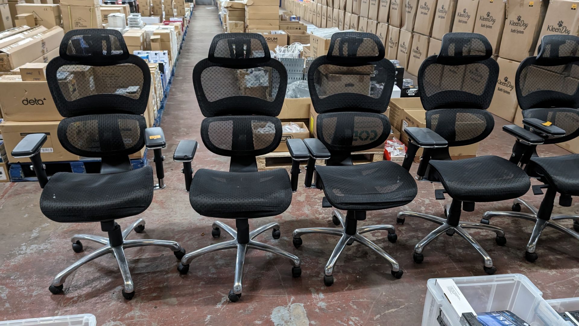 4 off black mesh fabric and chrome modern chairs with arms and headrests. NB: The chairs in lot 24