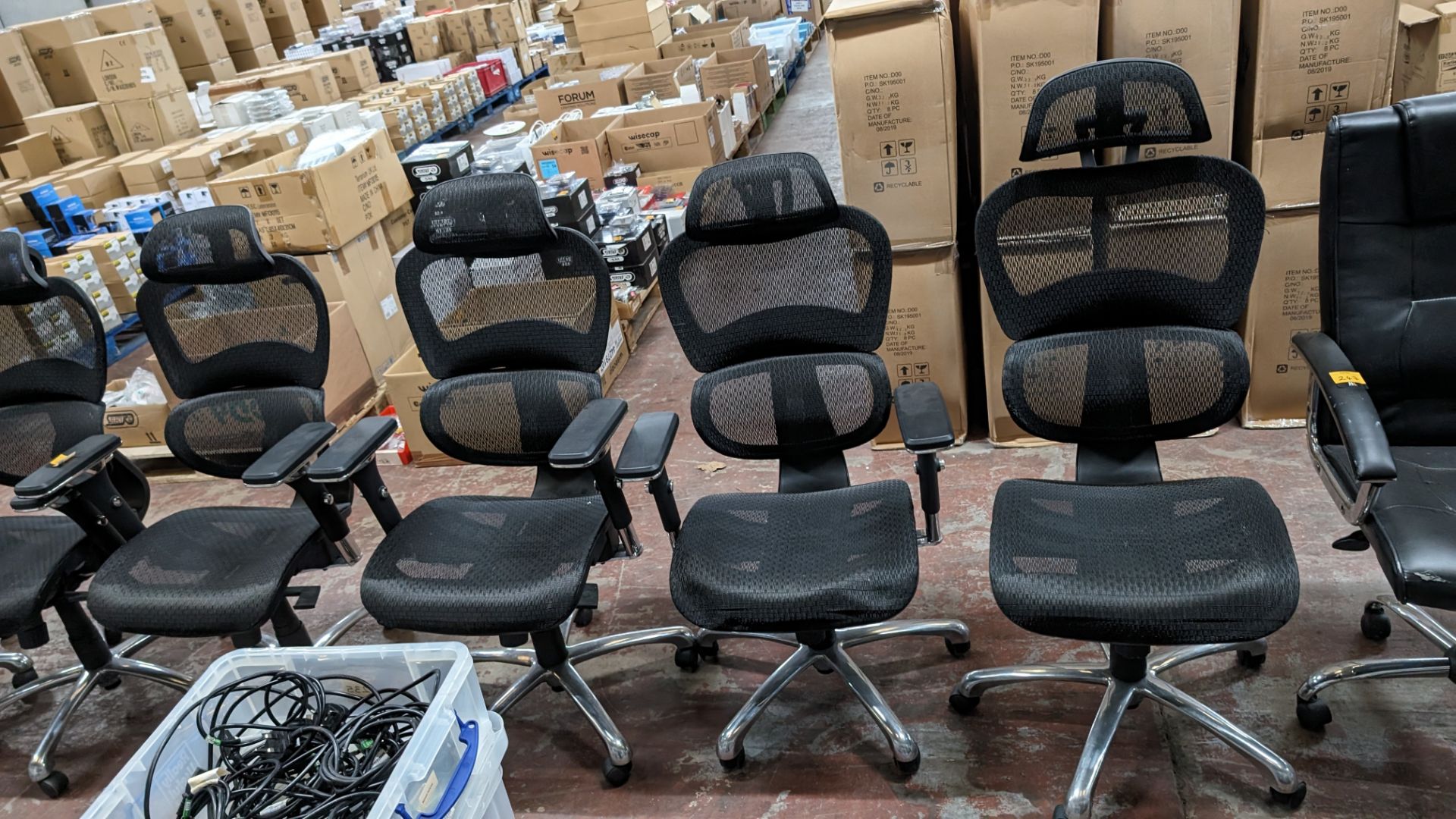 4 off black mesh fabric and chrome modern chairs with arms and headrests. NB: The chairs in lot 24