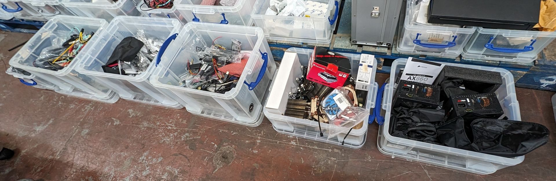 The contents of 6 crates of assorted computer components and miscellaneous